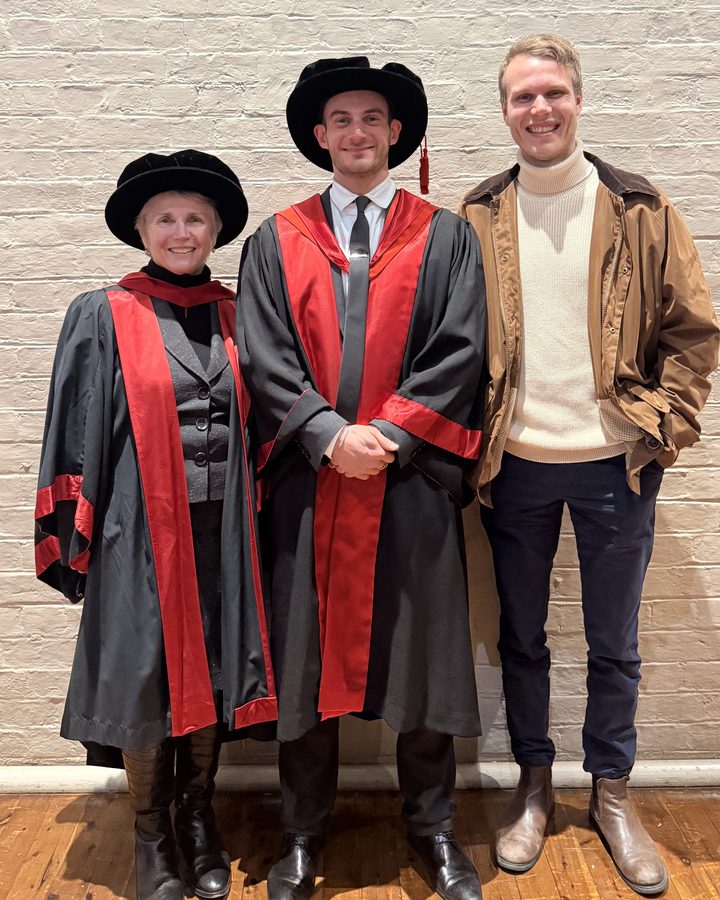 Dr Sulejman in academic dress at his PhD graduation with his supervisors Professor Ann Roberts and Dr Lukas Wesemann