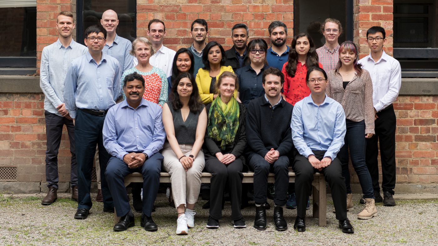 The TMOS group at the University of Melbourne, assembled outside the School of Physics