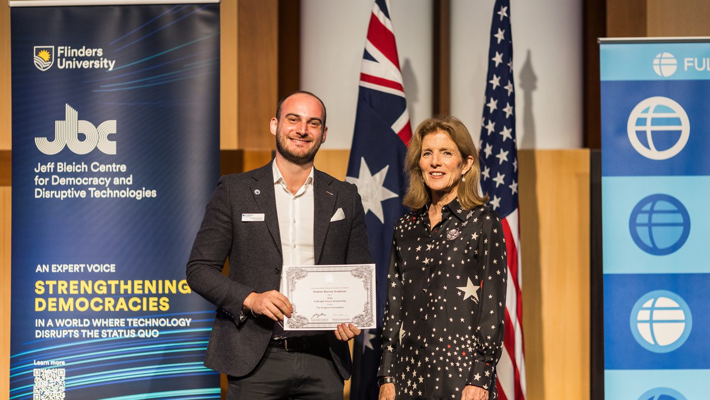 Dr Sulejman receiving the 2024 Fulbright Future Scholarship from US Ambassador Caroline Kennedy